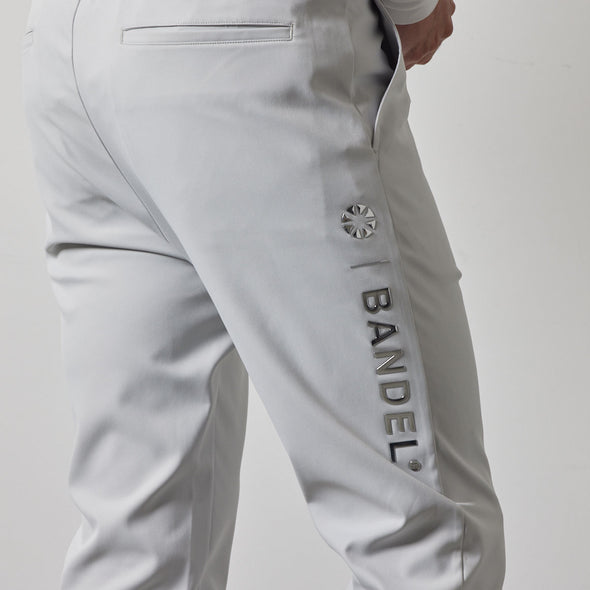 SIDE LOGO STRECH TAPERED PANTS