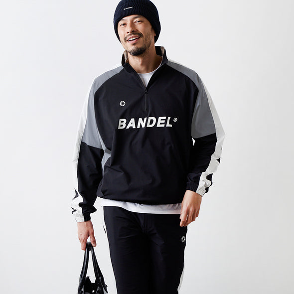 ユーティリティ ハーフジップジャケット