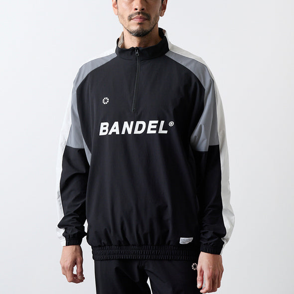 ユーティリティ ハーフジップジャケット