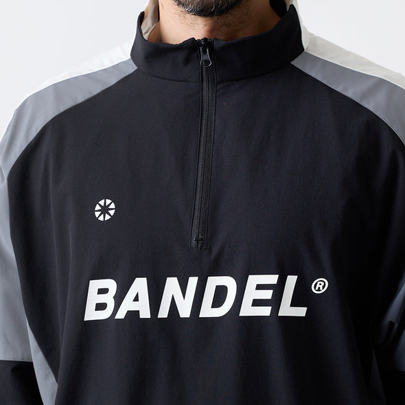 ユーティリティ ハーフジップジャケット