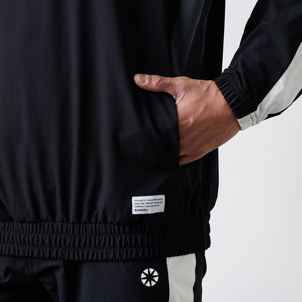 ユーティリティ ハーフジップジャケット