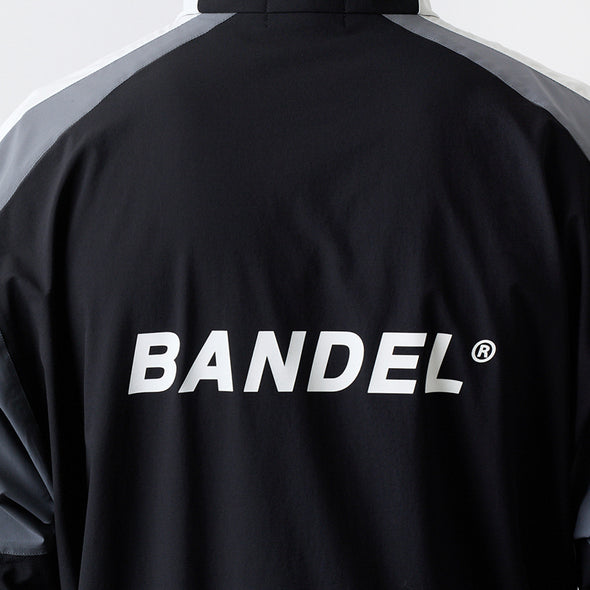 ユーティリティ ハーフジップジャケット